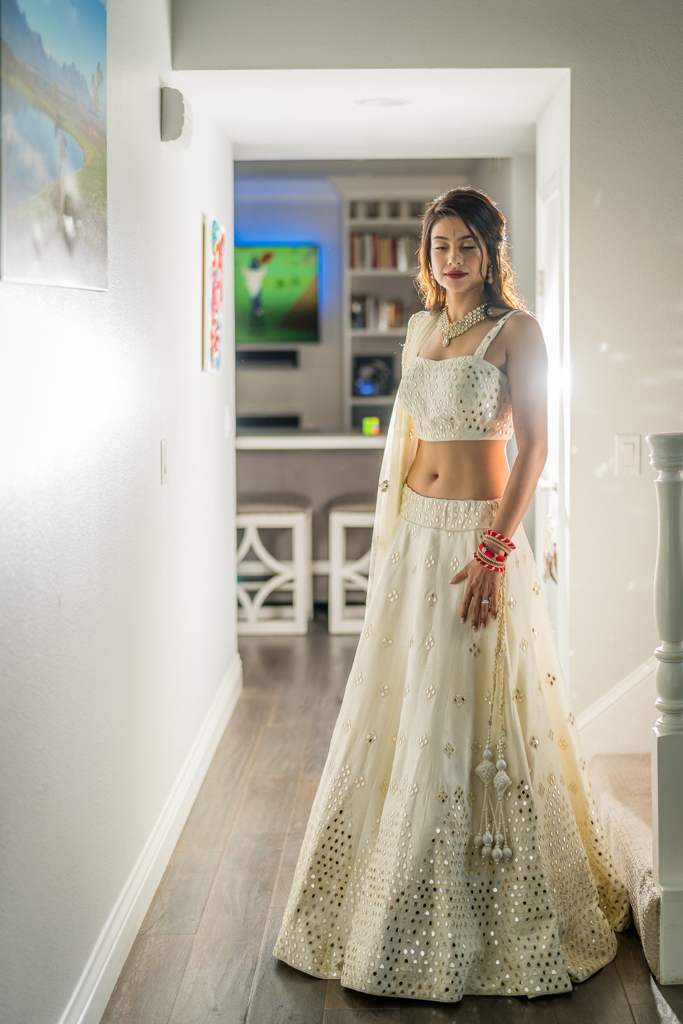 ThomasKim_photography A bride standing in a hallway.