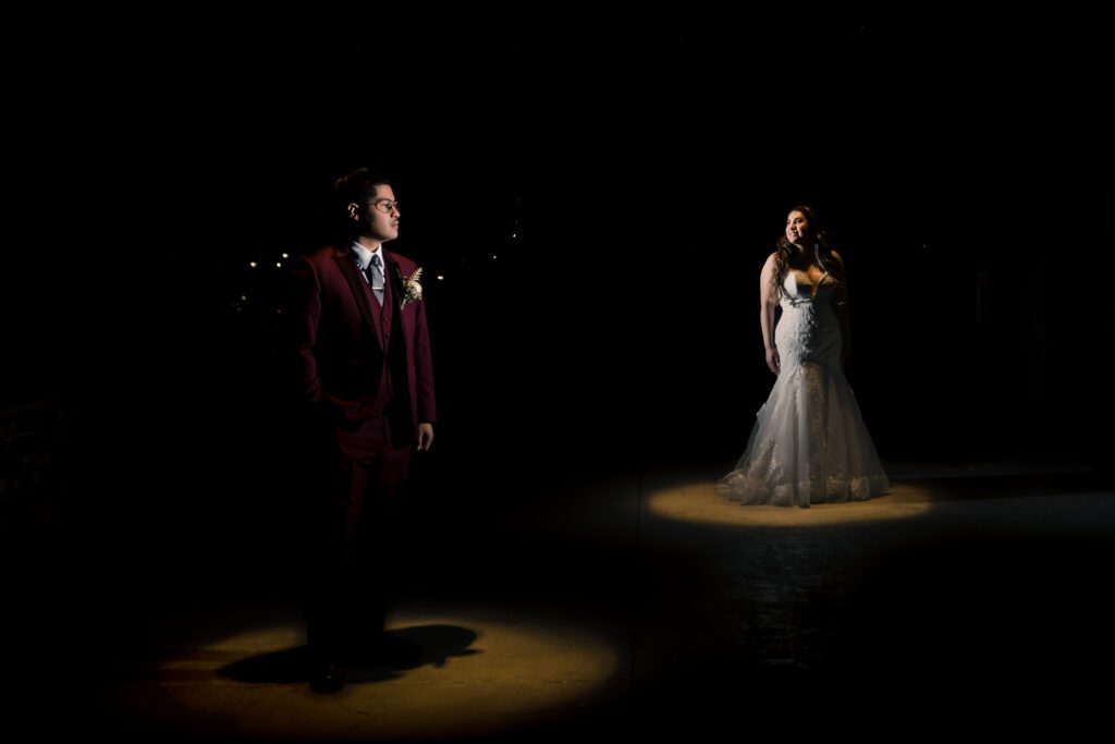 ThomasKim_photography 2024-2025 Wedding Photography: A bride and groom standing in the dark.