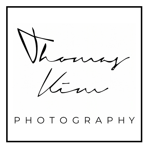 ThomasKim Photography Los Angeles Wedding Photographer Logo for Thomas Kim Photography featuring a handwritten-style signature above the word "PHOTOGRAPHY" in uppercase, all enclosed in a square border—perfectly capturing the elegance of Luxury Groom Portraits.