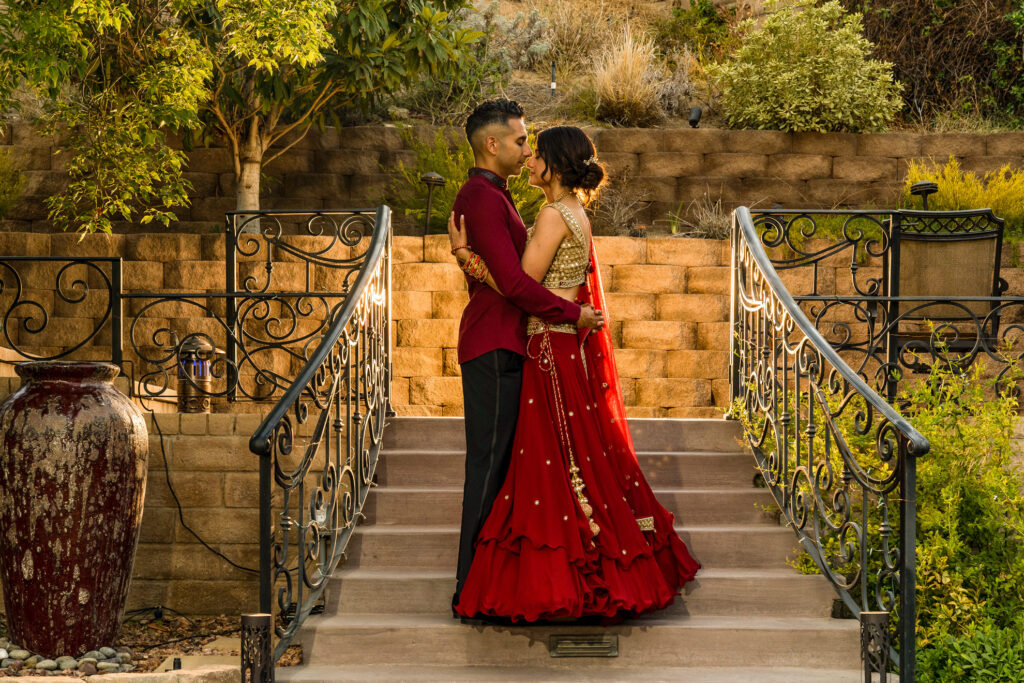 ThomasKim_photography A bride and groom (R & K) on the steps of a garden.|ThomasKim_photography A garden wedding with an R & K couple standing on the steps.
