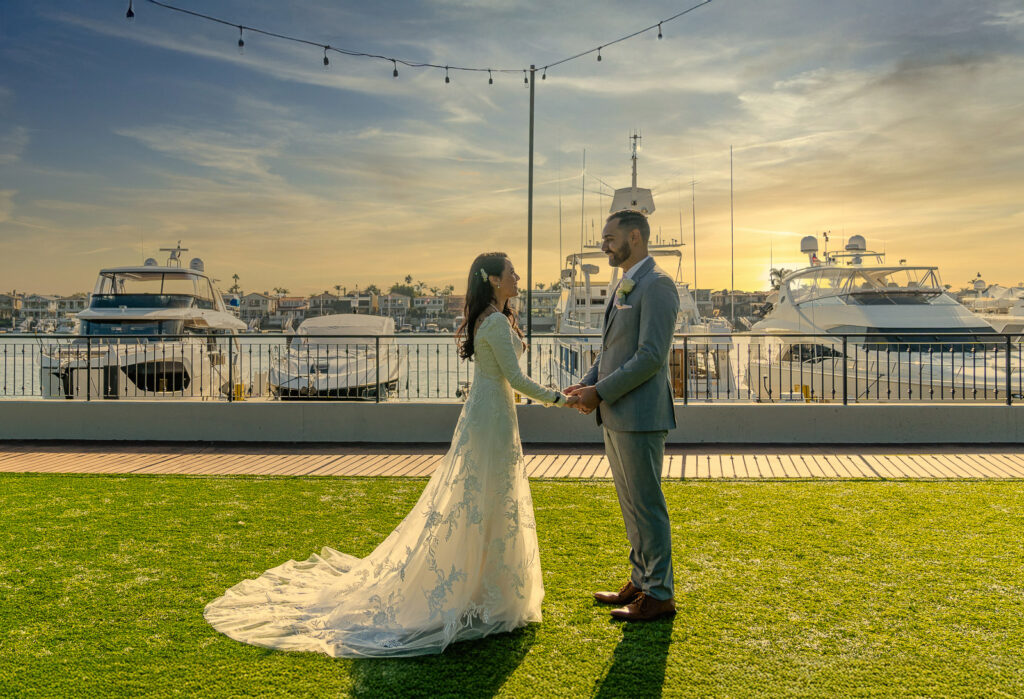 ThomasKim Photography Los Angeles Wedding Photographer A bride and groom stand on grass